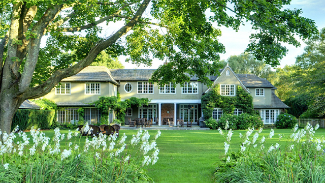 English Manor style home in East Hampton with magnificent gardens and grounds on 2.2 lush acres just a short distance to the ocean, The Maidstone Club and Main Street. Available for rent for the season with Town & Country Real Estate. (Courtesy Photo)